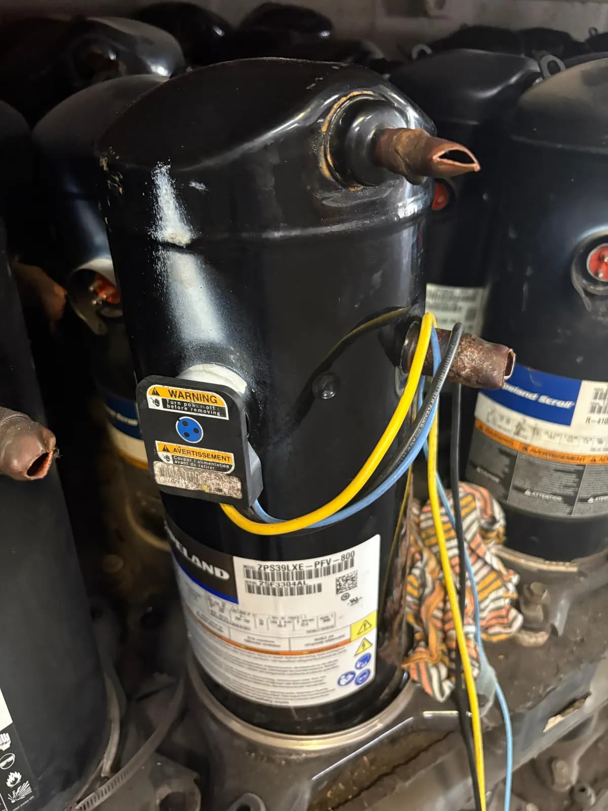 Used Copeland scroll compressor in stock, data plate showing model and serial number (1 of 8)
